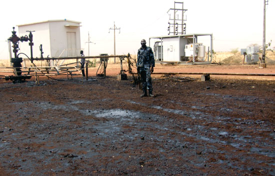 Oil spilling from Elnar 5; one of the bombed oil wells [©Gurtong]