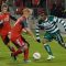 Santos Laguna forward Christian Suarez attempts to move the ball in between Toronto FC defender Richard Eckersley and midfielder Nick Soolsma. Both teams played to a draw in front of 18,950 fans at BMO Field in Toronto (Karan Vyas)