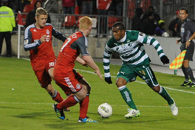 Santos Laguna forward Christian Suarez attempts to move the ball in between Toronto FC defender Richard Eckersley and midfielder Nick Soolsma. Both teams played to a draw in front of 18,950 fans at BMO Field in Toronto (Karan Vyas) Santos Laguna forward Christian Suarez attempts to move the ball in between Toronto FC defender Richard Eckersley and midfielder Nick Soolsma. Both teams played to a draw in front of 18,950 fans at BMO Field in Toronto (Karan Vyas)