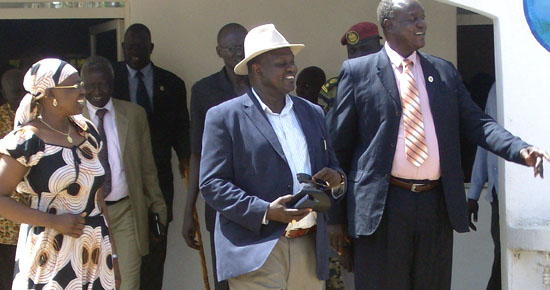 Dr. Riek Machar (C) and Jonglei State Governor Kuol Manyang (R) moments after opening the Peace, Reconciliation and Tolerance workshop in Bor [©Gurtong/ Jacob A. Jok]
