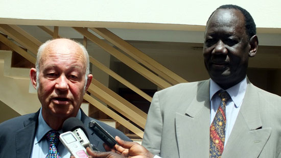 (L-R) Mr. Helmut Kutin and Charles Manyang speaking to the press after signing the agreement in Juba [Â©Gurtong/ Waakhe Wudu]