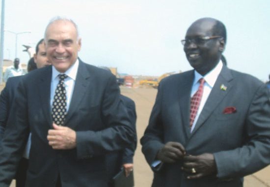(L-R) Mohammed Kemel received by Dr. Barnaba Marial upon arrival at the Juba International Airport [Â©Gurtong/Waakhe Wudu]