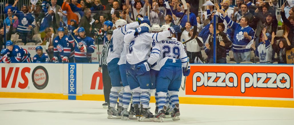 The Toronto Marlies celebrate one of its three goals in the third period in a 4-3 win over the Rochester Americans on Thursday night. The Marlies used its home ice advantage at Ricoh Colisuem to take a 1-0 lead in the best-of-five first round series (John Lucero)