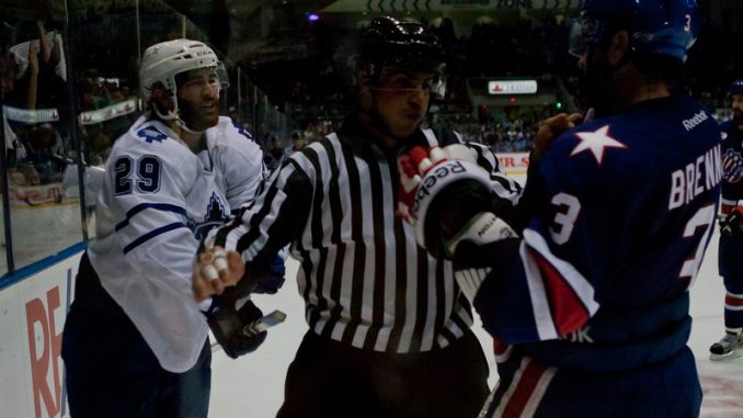 Toronto Marlies winger Jerry D'Amigo and Rochester Americans defenceman T.J. Brennan are separated by an official as tensions heated up in game two of the best-of-five Western Conference quarterfinals. D'Amigo was the hero once again scoring two goals and the game winner in a 4-3 win on Saturday afternoon at a sold-out Ricoh Coliseum (JP Dhanoa)