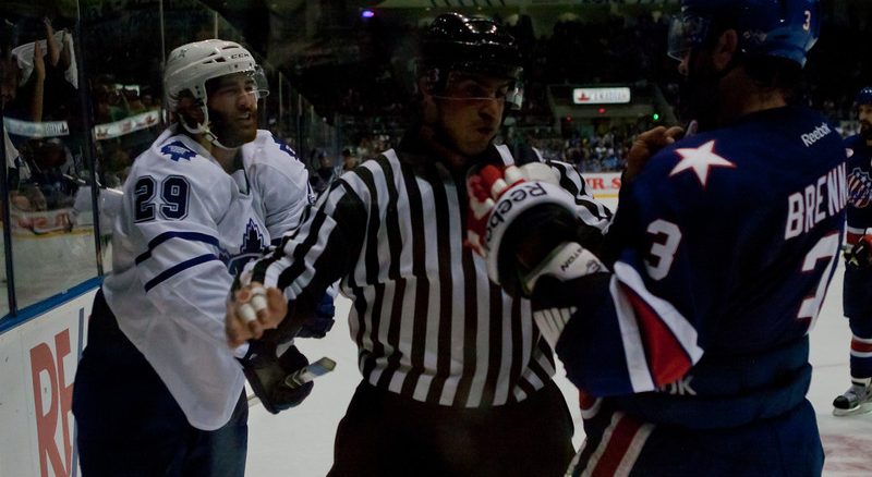 Toronto Marlies winger Jerry D'Amigo and Rochester Americans defenceman T.J. Brennan are separated by an official as tensions heated up in game two of the best-of-five Western Conference quarterfinals. D'Amigo was the hero once again scoring two goals and the game winner in a 4-3 win on Saturday afternoon at a sold-out Ricoh Coliseum (JP Dhanoa)
