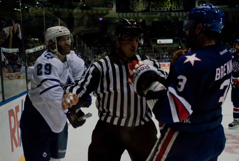 Toronto Marlies winger Jerry D'Amigo and Rochester Americans defenceman T.J. Brennan are separated by an official as tensions heated up in game two of the best-of-five Western Conference quarterfinals. D'Amigo was the hero once again scoring two goals and the game winner in a 4-3 win on Saturday afternoon at a sold-out Ricoh Coliseum (JP Dhanoa) Toronto Marlies winger Jerry D'Amigo and Rochester Americans defenceman T.J. Brennan are separated by an official as tensions heated up in game two of the best-of-five Western Conference quarterfinals. D'Amigo was the hero once again scoring two goals and the game winner in a 4-3 win on Saturday afternoon at a sold-out Ricoh Coliseum (JP Dhanoa)