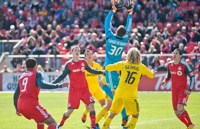 Columbus Crew goalkeeper Andy Gruenebaum leaps up to grab a ball in the air on Saturday afternoon at BMO Field. The Crew capitalized on a Toronto FC mistake in the second half and hung on for a 1-0 win (John Lucero)