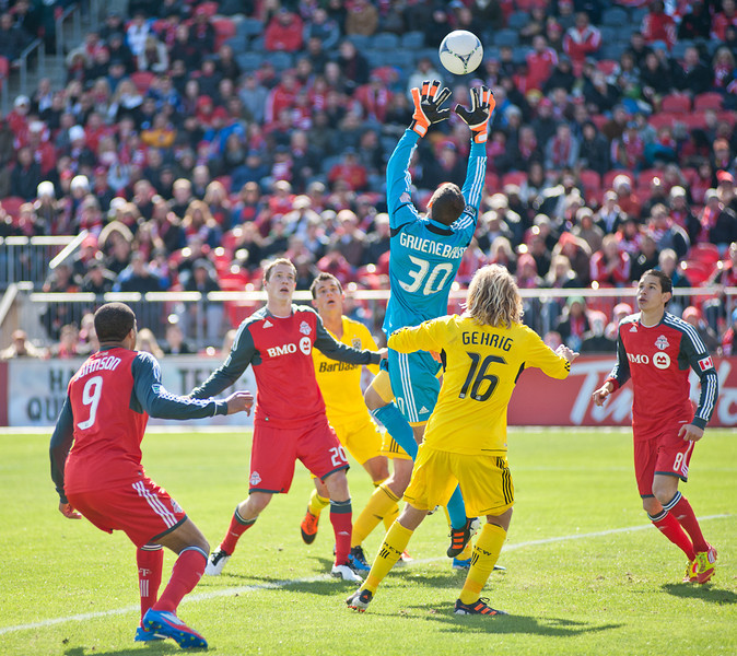 Columbus Crew goalkeeper Andy Gruenebaum leaps up to grab a ball in the air on Saturday afternoon at BMO Field. The Crew capitalized on a Toronto FC mistake in the second half and hung on for a 1-0 win (John Lucero) Columbus Crew goalkeeper Andy Gruenebaum leaps up to grab a ball in the air on Saturday afternoon at BMO Field. The Crew capitalized on a Toronto FC mistake in the second half and hung on for a 1-0 win (John Lucero)
