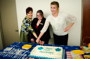 Voices For Change members are cutting the Cake on their first annual celebration