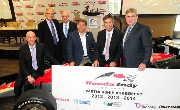 Honda Indy Toronto Renews Important Contracts Green Savoree Toronto announced today the renewal of contracts that reside at the heart of the Honda Indy Toronto, which takes place July 6-8, 2012. Contract renewals have been signed with the City of Toronto, Honda Canada, Exhibition Place, Tourism Toronto and INDYCAR through to 2014. Left to Right: Dave Gardner, Vice President of Honda Canada; Kim Green, Co-Owner of Green Savoree Toronto; David Whitaker, President of Tourism Toronto; Mark Grimes, Councillor Ward 6 & Chair of Exhibition Place; Randy Bernard, CEO of INDYCAR; Kevin Savoree, Co-Owner of Green Savoree Toronto.