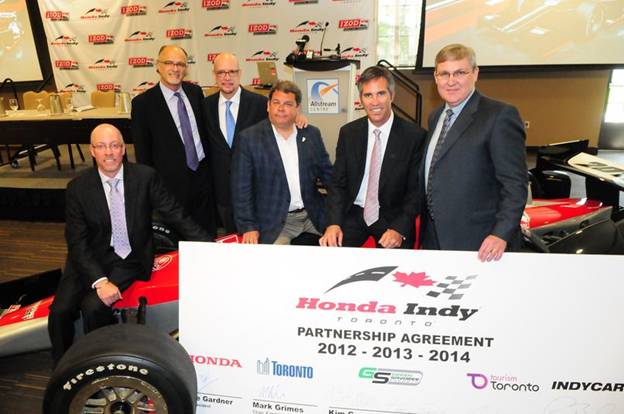 Green Savoree Toronto announced today the renewal of contracts that reside at the heart of the Honda Indy Toronto, which takes place July 6-8, 2012. Contract renewals have been signed with the City of Toronto, Honda Canada, Exhibition Place, Tourism Toronto and INDYCAR through to 2014. Left to Right: Dave Gardner, Vice President of Honda Canada; Kim Green, Co-Owner of Green Savoree Toronto; David Whitaker, President of Tourism Toronto; Mark Grimes, Councillor Ward 6 & Chair of Exhibition Place; Randy Bernard, CEO of INDYCAR; Kevin Savoree, Co-Owner of Green Savoree Toronto. Green Savoree Toronto announced today the renewal of contracts that reside at the heart of the Honda Indy Toronto, which takes place July 6-8, 2012. Contract renewals have been signed with the City of Toronto, Honda Canada, Exhibition Place, Tourism Toronto and INDYCAR through to 2014. Left to Right: Dave Gardner, Vice President of Honda Canada; Kim Green, Co-Owner of Green Savoree Toronto; David Whitaker, President of Tourism Toronto; Mark Grimes, Councillor Ward 6 & Chair of Exhibition Place; Randy Bernard, CEO of INDYCAR; Kevin Savoree, Co-Owner of Green Savoree Toronto.