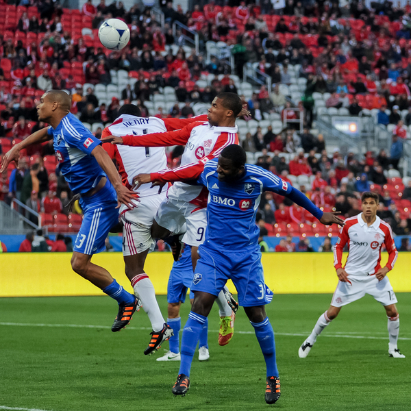 Toronto FC's Ryan Johnson (centre) wins the battle for a header against teammate Doneil Henry and Montreal Impact's Matteo Ferrari (left) and Shavar Thomas (right). TFC won 2-0 against the Impact on Wednesday night at BMO Field (Karan Vyas) Toronto FC's Ryan Johnson (centre) wins the battle for a header against teammate Doneil Henry and Montreal Impact's Matteo Ferrari (left) and Shavar Thomas (right). TFC won 2-0 against the Impact on Wednesday night at BMO Field (Karan Vyas)