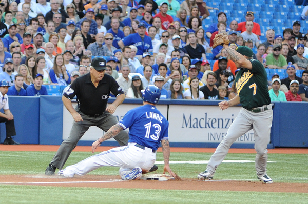 Toronto Blue Jays third baseman Brett Lawrie tagged from second base after a fly ball out but was thrown out at third by his Oakland Athletics counterpart Brandon Inge in the first inning. A big seventh inning propelled the A's to a 7-2 victory at the Rogers Centre on Tuesday night (Karan Vyas) Toronto Blue Jays third baseman Brett Lawrie tagged from second base after a fly ball out but was thrown out at third by his Oakland Athletics counterpart Brandon Inge in the first inning. A big seventh inning propelled the A's to a 7-2 victory at the Rogers Centre on Tuesday night (Karan Vyas)