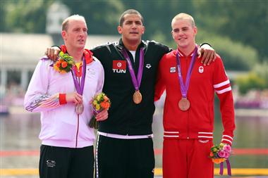 Richard Weinberger (right) of Victoria firmly established himself among the world’s best in the men’s 10 kilometre marathon swimming race on Friday winning the bronze medal at the 2012 Olympics Games. He shared the podium with gold medal winner Oussama Mellouli of Tunisia (centre) and Thomas Lurz of Germany (left) who claimed the silver medal. (Photo: Ian McNicol/Swimming Canada) Richard Weinberger (right) of Victoria firmly established himself among the world’s best in the men’s 10 kilometre marathon swimming race on Friday winning the bronze medal at the 2012 Olympics Games. He shared the podium with gold medal winner Oussama Mellouli of Tunisia (centre) and Thomas Lurz of Germany (left) who claimed the silver medal. (Photo: Ian McNicol/Swimming Canada)