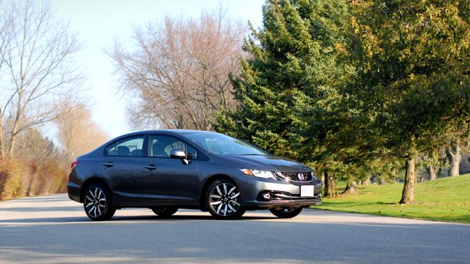 Dark accents, smooth lines, confident stance. The 2013 Honda Civic EX-L