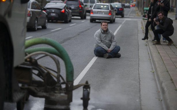 Work of Removing Jarvis St. Bike Lane Faces Protest