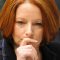Furious media giants lash out at Gillard