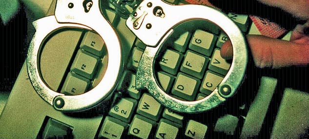 images_News_Canada_Keyboard-with-handcuffs