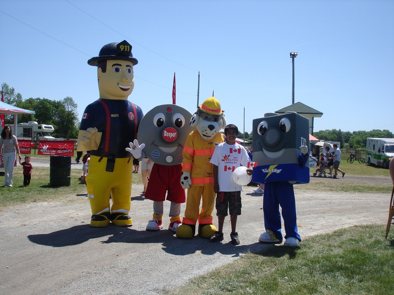 images_Lifestyle_Teens_Milty Beeper Sparky and Volty posing with Harnoor on Canada Day in Milton Fairgrounds 2011 2