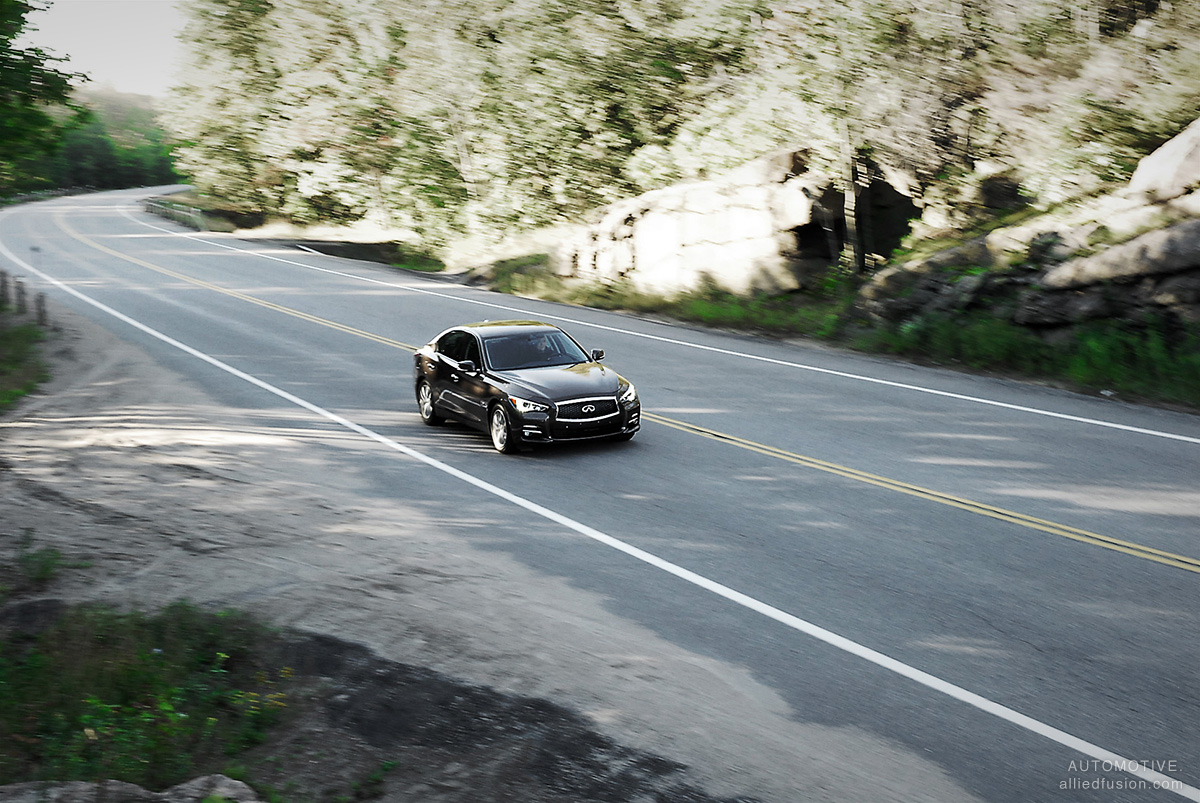 The 2014 Infiniti Q50 on a scenic by road in Ontario's cottage country The 2014 Infiniti Q50 on a scenic by road in Ontario's cottage country