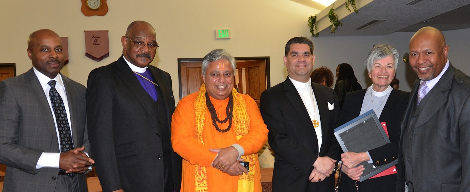 At the Service, from left to right, are— Professor Benjamin Holden, Church of God in Christ Bishop Luther James DuPree Junior, Hindu statesman Rajan Zed, International Community of Christ Bishop Gene Savoy Junior, Trinity Episcopal Church Deacon Patsy Pumphrey and Second Baptist Church Pastor Michael L. Randle. (Picture by: Robert Roy)