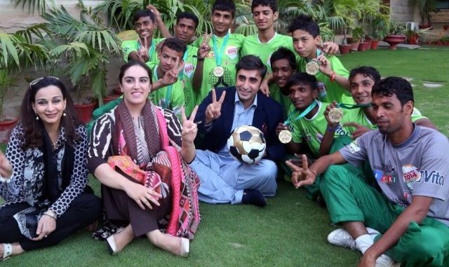 Child Footballers Paint Sindh Green