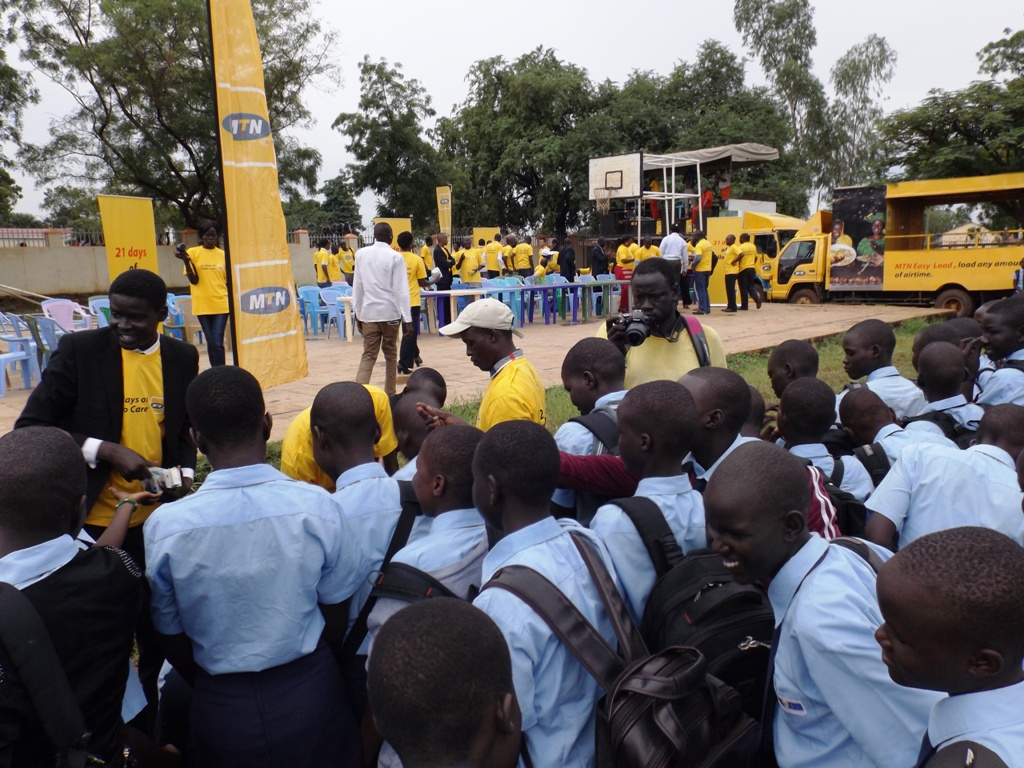 MTN staff distributes water purification tablets MTN staff distributes water purification tablets