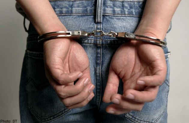 images_News_Asia_20141807_handcuffs_st