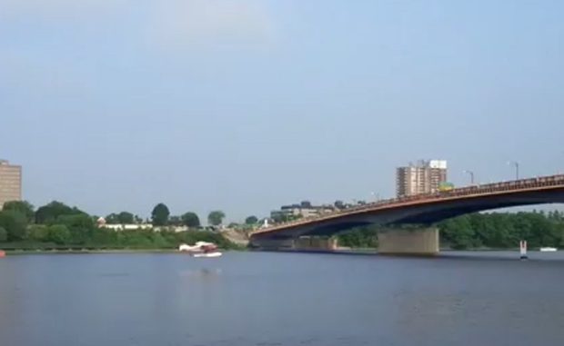 Onlookers Shocked as Float Plane Flies Under Ottawa Bridge