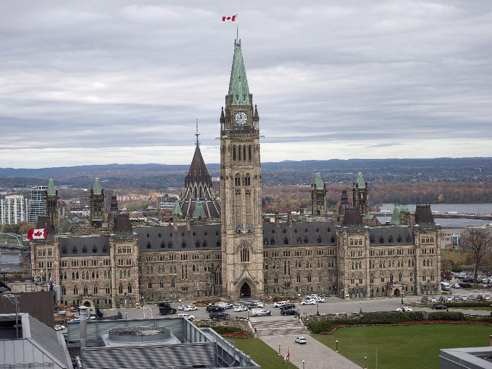 images_News_Canada_centre-block-on-parliament-hill-in-ottawa-is-surrounded-by-p