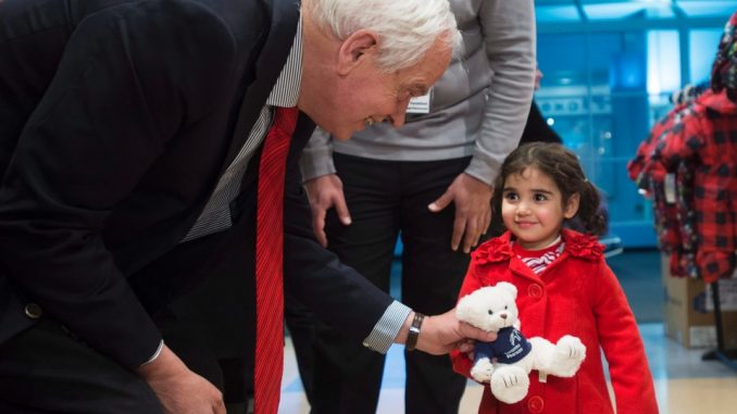 ottawa hints more syrian refugees means lesser immigrants from elsewhere