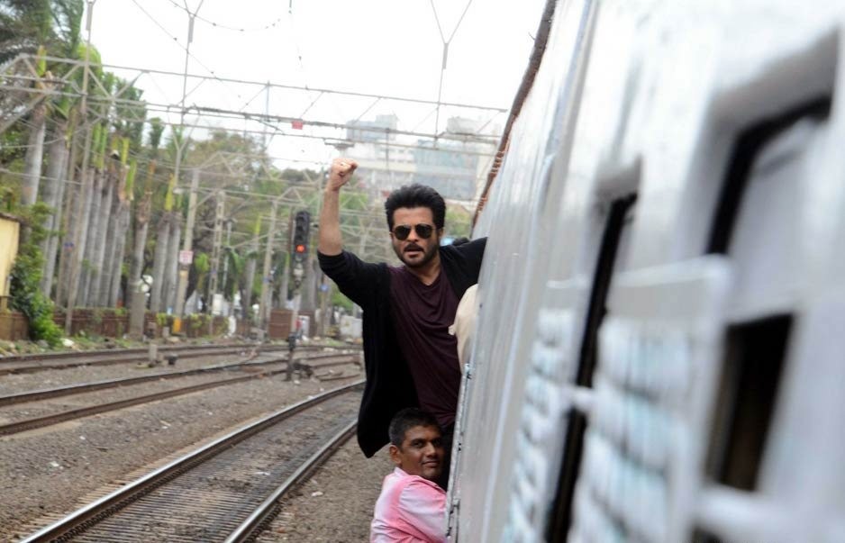 Anil Kapoor lunging out of a Mumbai local train during promotions for 24. Anil Kapoor lunging out of a Mumbai local train during promotions for 24.