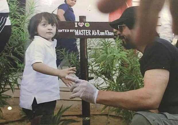 shah rukh khan helps abram in tree plantation
