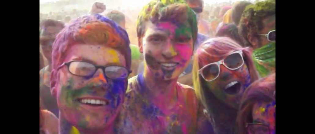 Body surfing at the Festival of Colors Holi