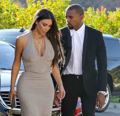 Kim Kardashian shows off her sexy curves for a friend's wedding