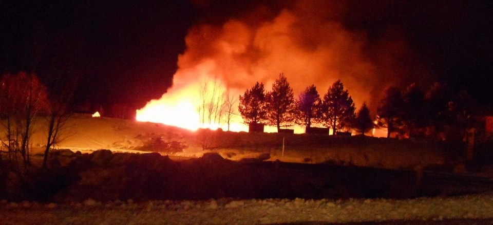 suspect in custody after school, town hall, rcmp office set ablaze in n.l.