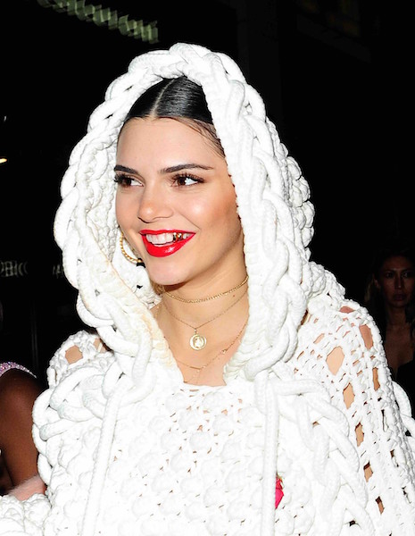 kendall jenner flashes her gold tooth