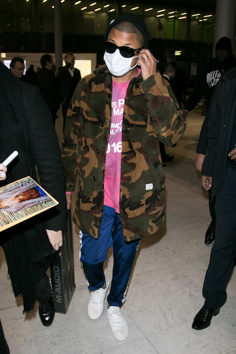 why is pharrell williams wearing a surgical mask?