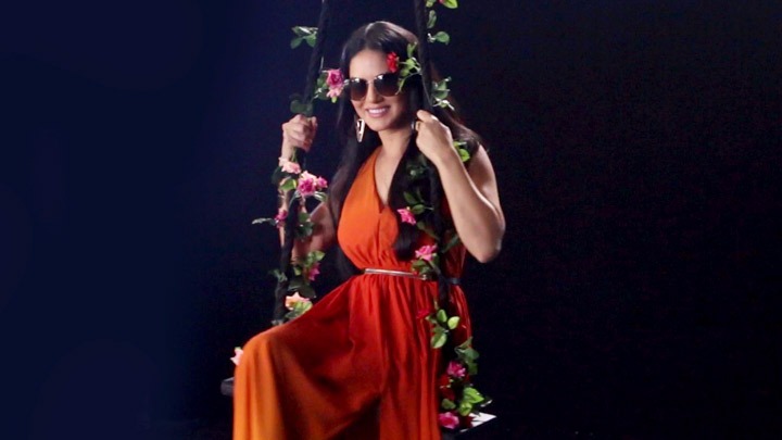 Check out Sunny Leone poses on a swing for a sexy photoshoot1