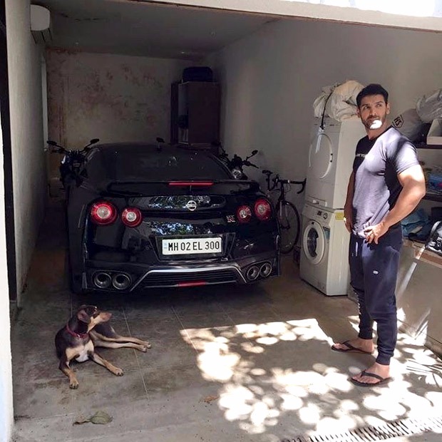 Must See John Abraham poses for a picture with his Godzilla