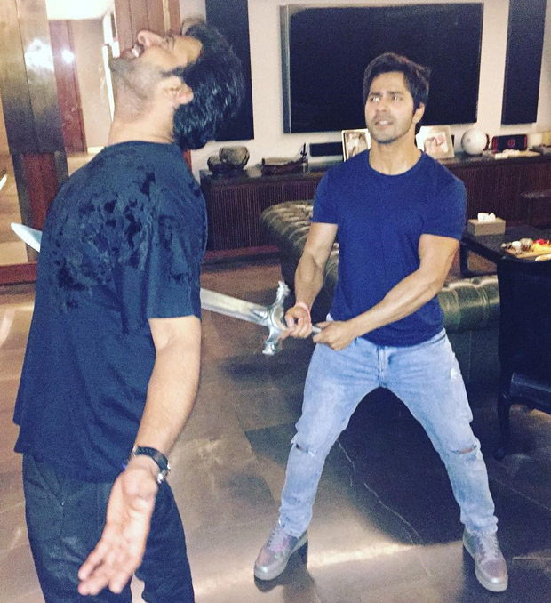 Varun Dhawan stabs Baahubali Prabhas recreating famous Baahubali- Kattappa moment