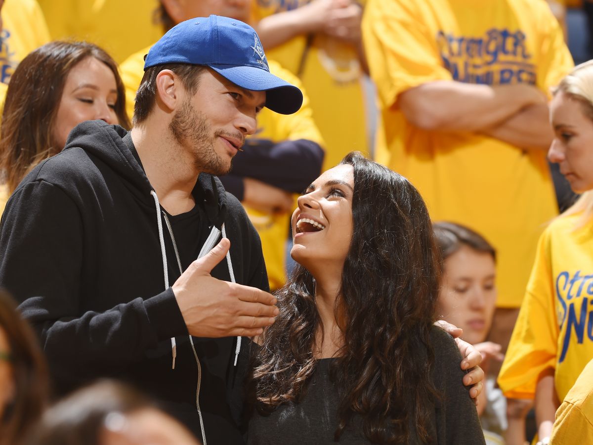 ashton kutcher spills the details on his first real kiss with mila kunis