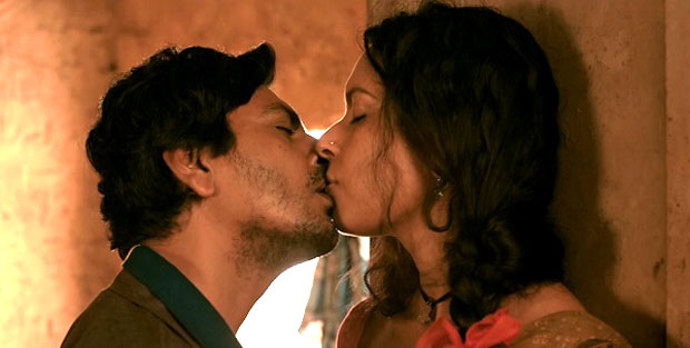 HOT! Nawazuddin Siddiqui engages in a SENSUOUS LIPLOCK with THIS HEROINE in Babumoshai Bandookbaaz