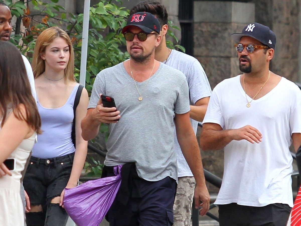 people really want to know what leonardo dicaprio is carrying in this plastic bag