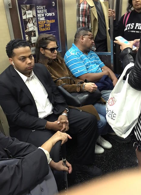 katie holmes endures manspreading on the subway