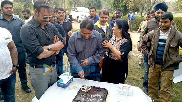 Ajay Devgn celebrates producer Kumar Mangat Pathak's birthday on the sets of 'Raid'
