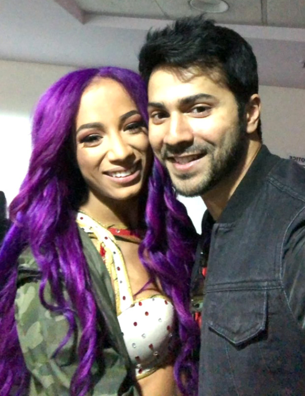 WATCH-Varun-Dhawan-meets-WWE-superstars-Jindar-Mahar,-Sasha-Banks-and-Triple-H-in-New-Delhi-(1)