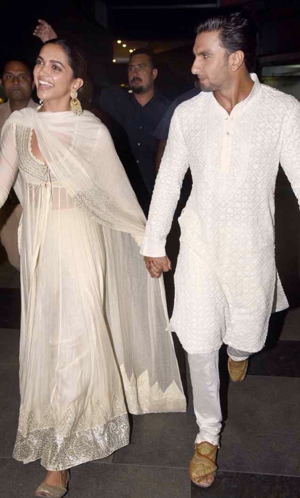 love is in the air as deepika padukone and ranveer singh walk hand in hand and twin in white for the padmaavat screening!