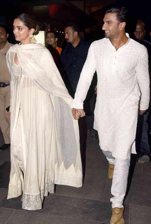 love is in the air as deepika padukone and ranveer singh walk hand in hand and twin in white for the padmaavat screening!