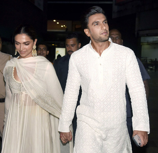 love is in the air as deepika padukone and ranveer singh walk hand in hand and twin in white for the padmaavat screening!